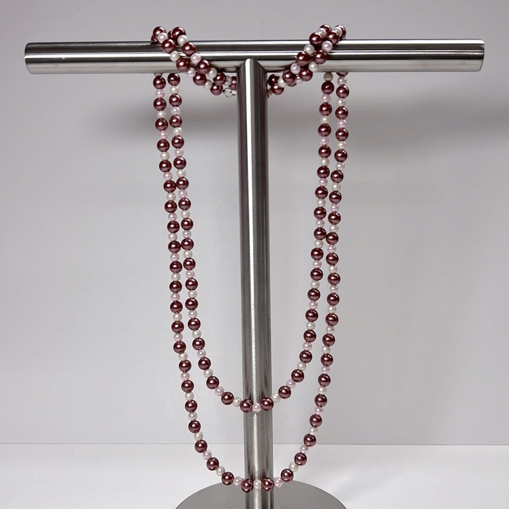 Extra long pearl necklace.